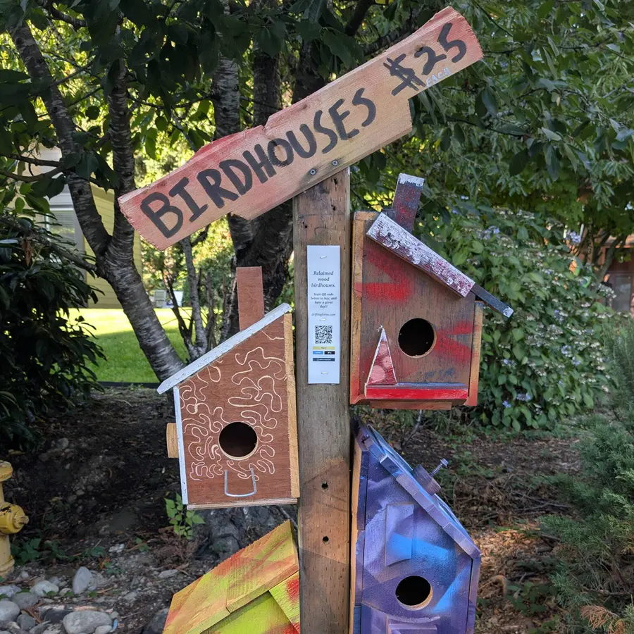 Colorful reclaimed-wood birdhouses at the Studio Stand
